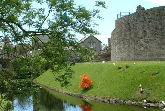 Rothesay Castle with Bute Museum in the background.